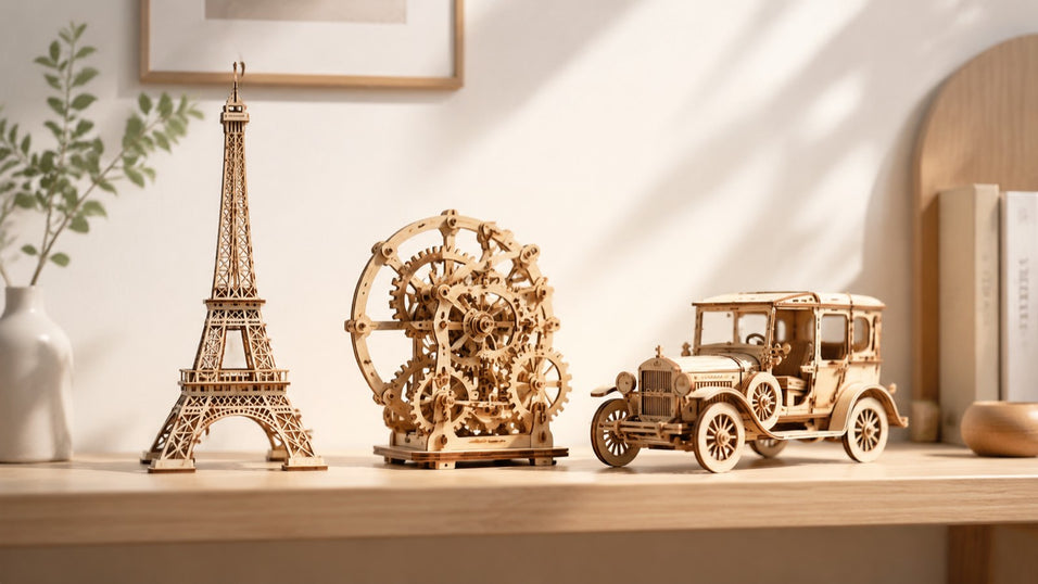 A curated display of the best 3D wooden puzzles for adults, featuring an architectural model, a mechanical gear set, and a vintage car on a minimalist shelf.