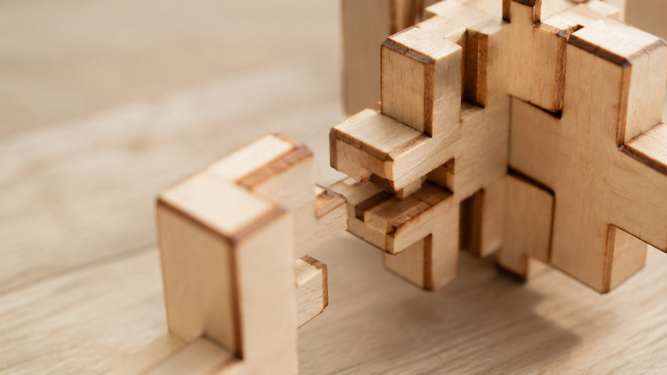Macro shot of realistic laser-cut mortise and tenon joints on a Jigden kit