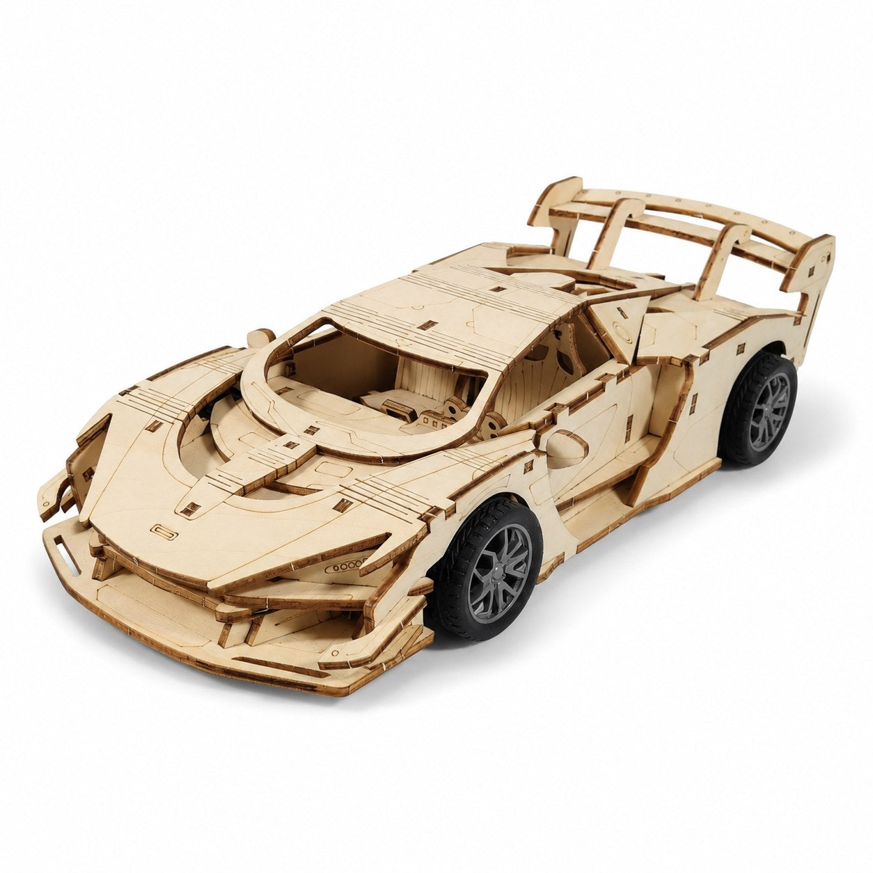 Assembled Jigden 3D wooden supercar model on white background