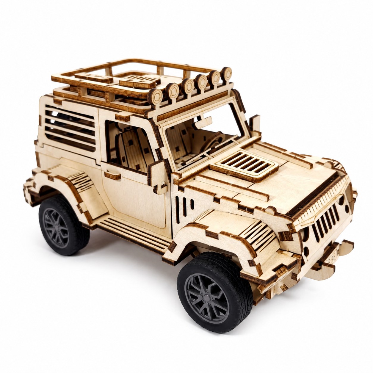 Rugged 4x4 3D wooden model kit with rubber tires on white background