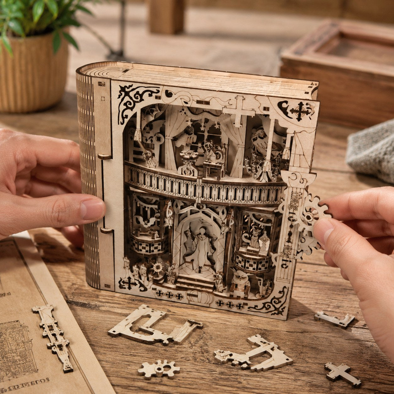 Person assembling the Magical Book Box 3D Wooden Puzzle