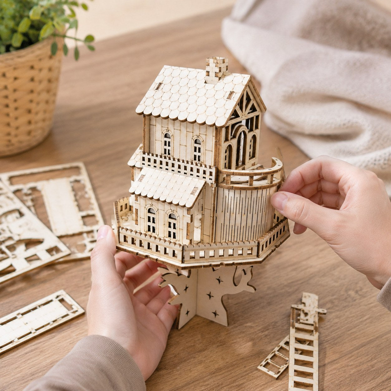 Adult assembling the Whimsical Treehouse 3D Wooden Puzzle
