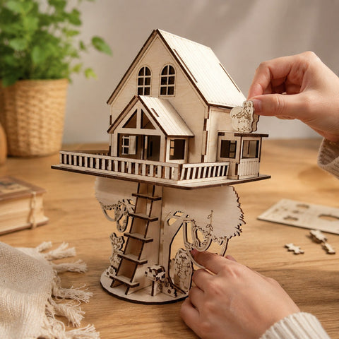 Person assembling the woodland treehouse 3D wooden puzzle