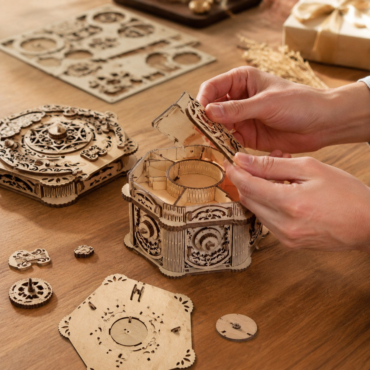 Person assembling the Mechanical Jewelry Box 3D Wooden Puzzle