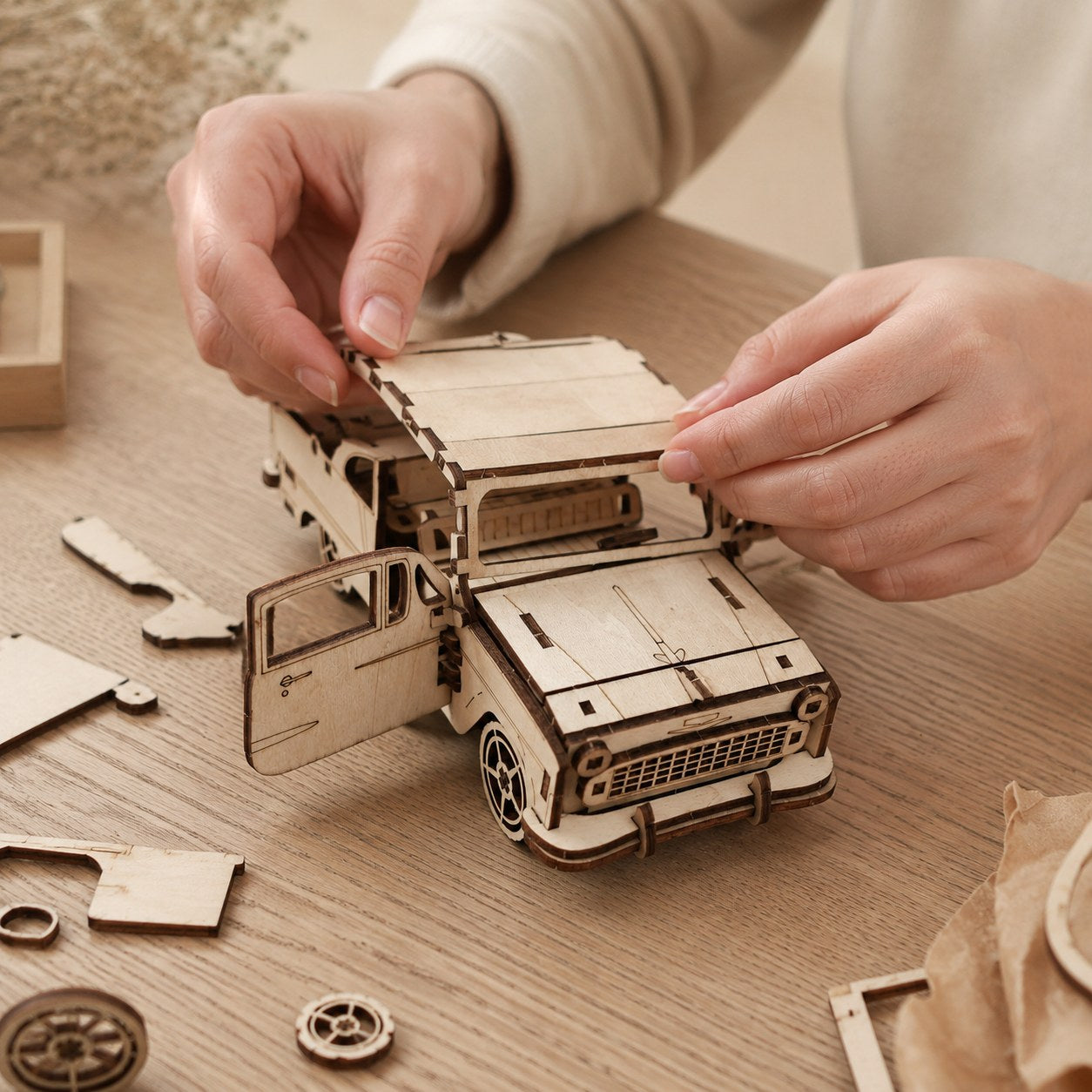Adult assembling the Vintage Sedan 3D Wooden Puzzle