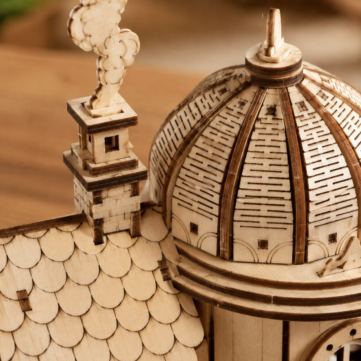 Macro close-up of the laser-cut wood details on the treehouse roof
