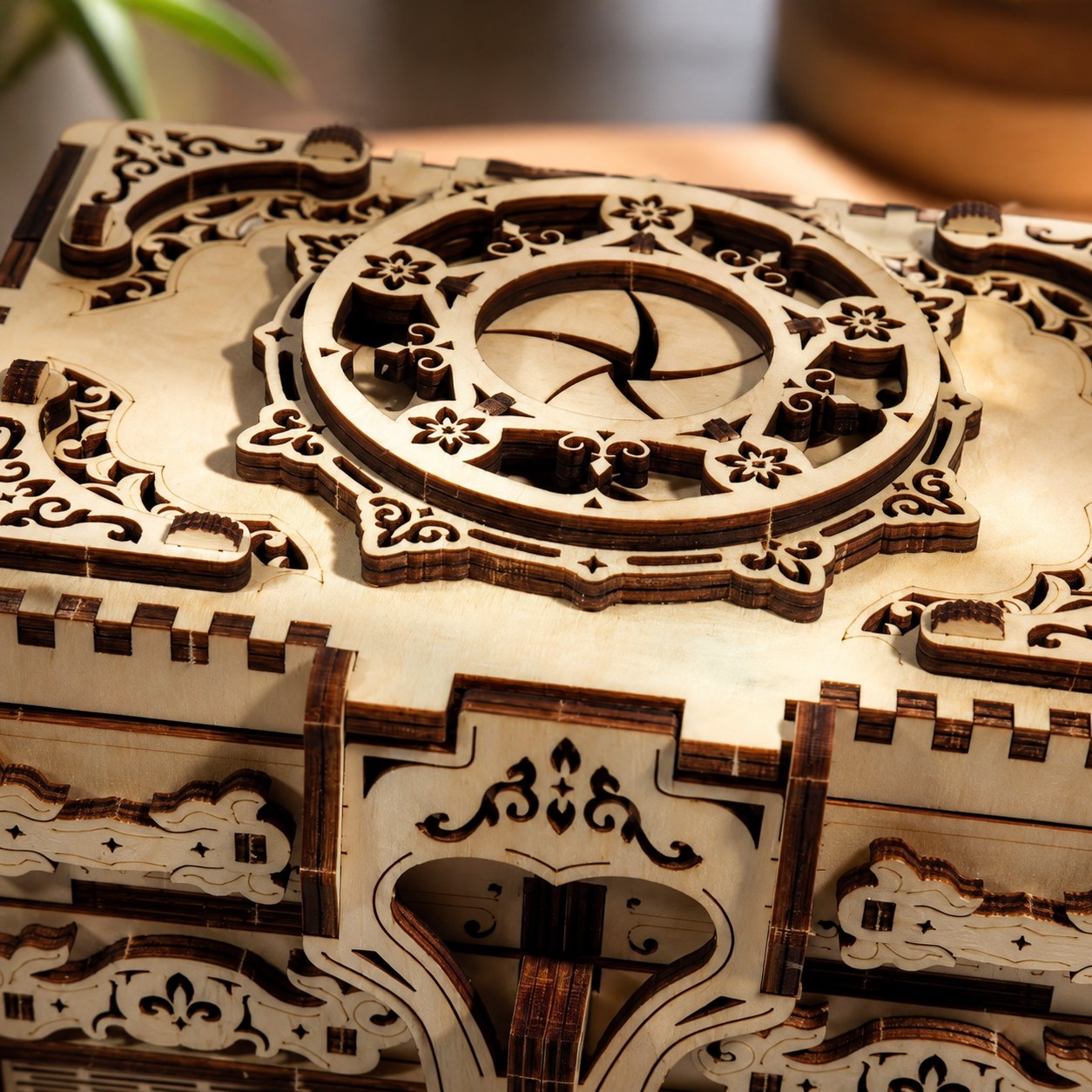 Macro close-up of laser-cut wood details and gears on the jewelry box