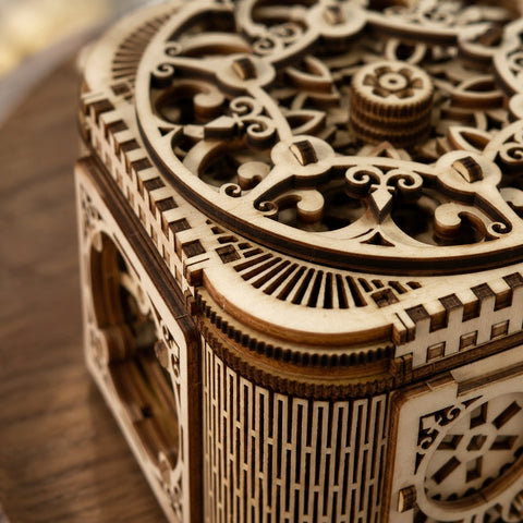 Close-up of laser-cut filigree and living hinge on wooden puzzle box