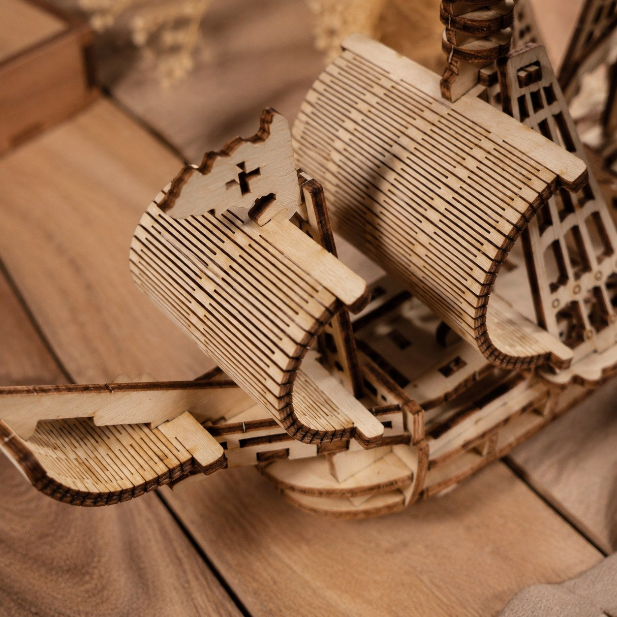Close-up of the flexible laser-cut wooden sails