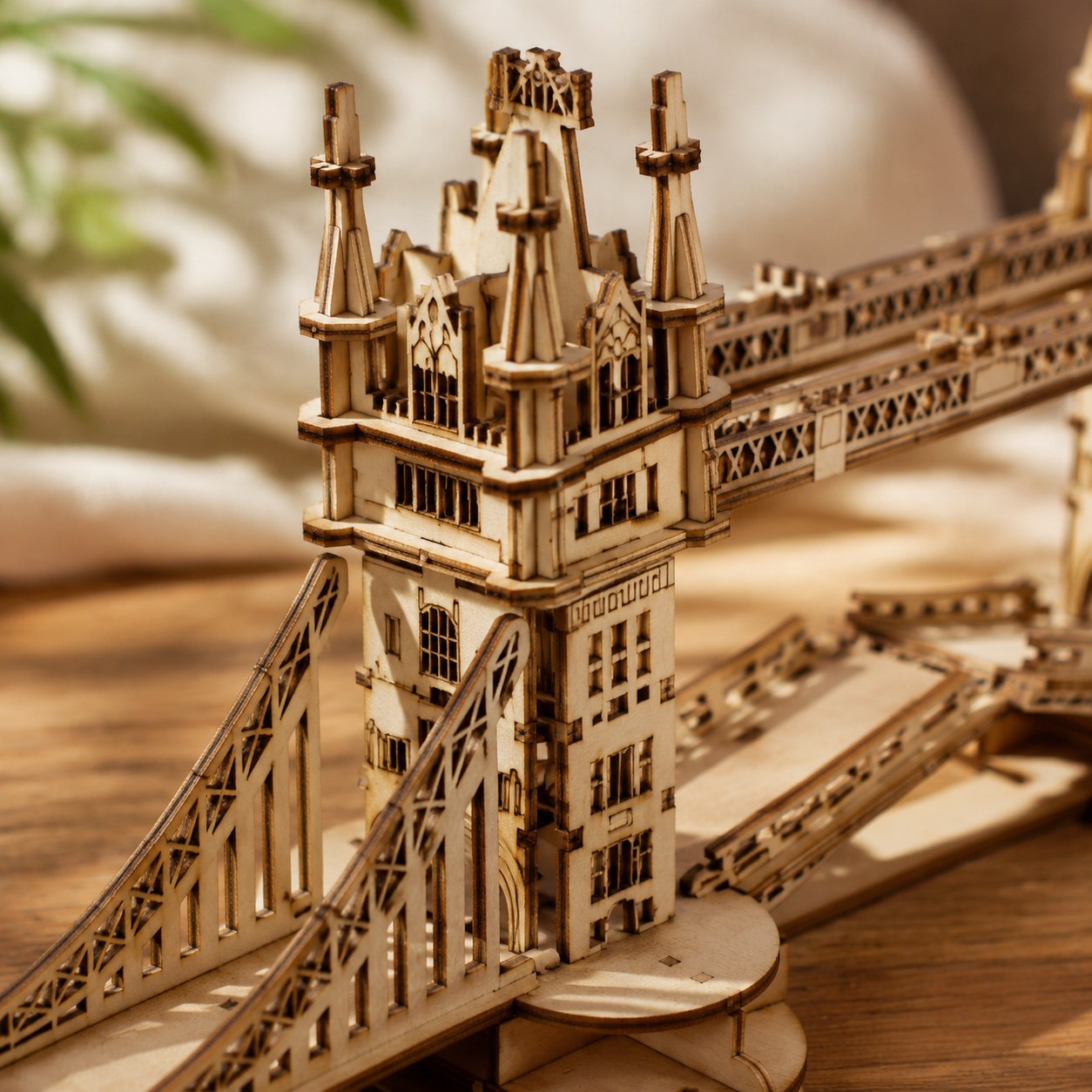 Macro close-up of the laser-cut brickwork and details on the wooden tower bridge model