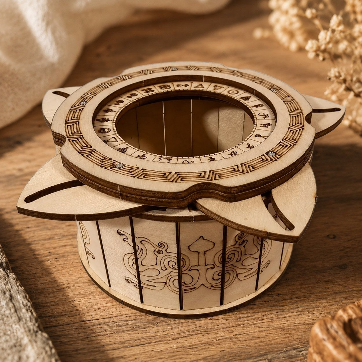 Close-up of laser-engraved details on the wooden puzzle box
