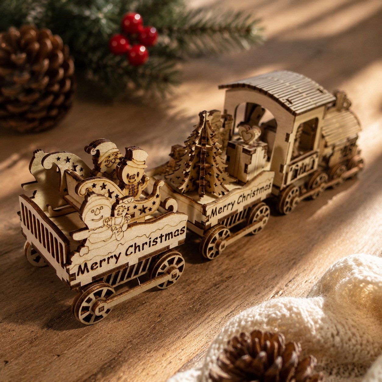 Close-up of Merry Christmas engraving on wooden train