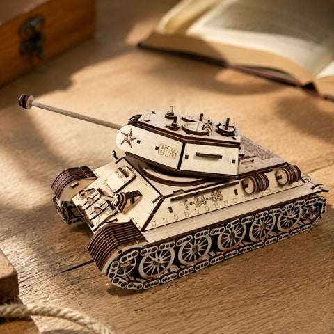 Close-up of laser-cut wooden tracks and engravings on the tank