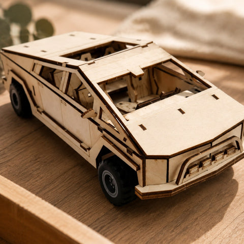 Macro close-up of laser-cut details on the wooden pickup truck model