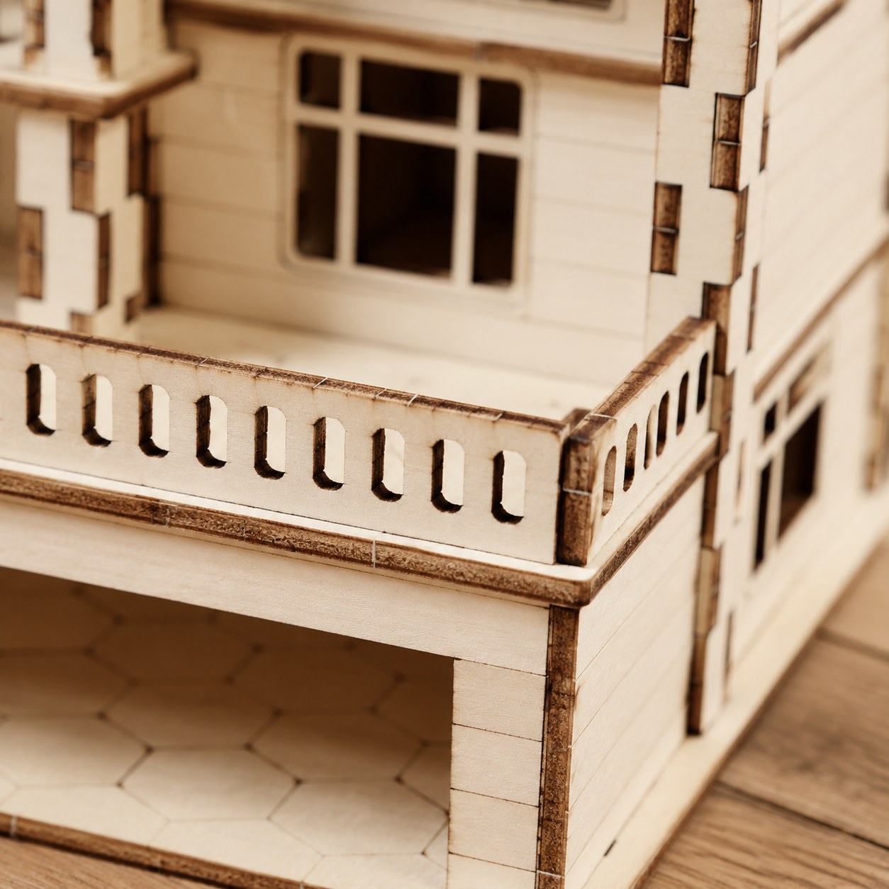 Macro detail of laser-cut wood on the Modern Villa puzzle