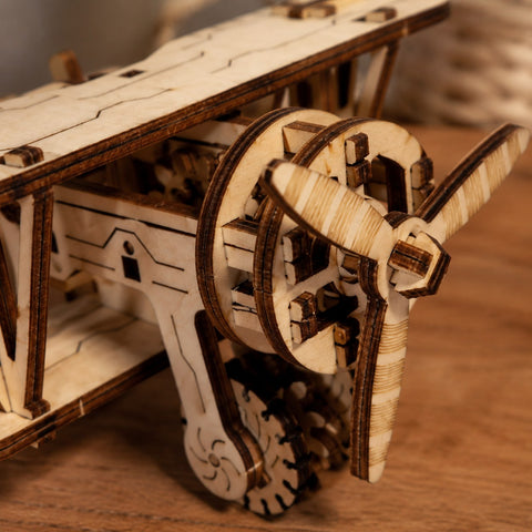 Macro close-up of the laser-cut wooden propeller and engine details