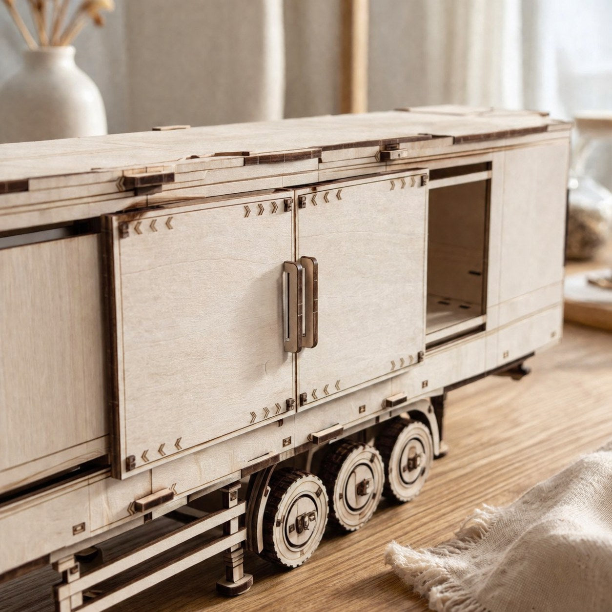 Laser-cut details on the wooden cargo trailer