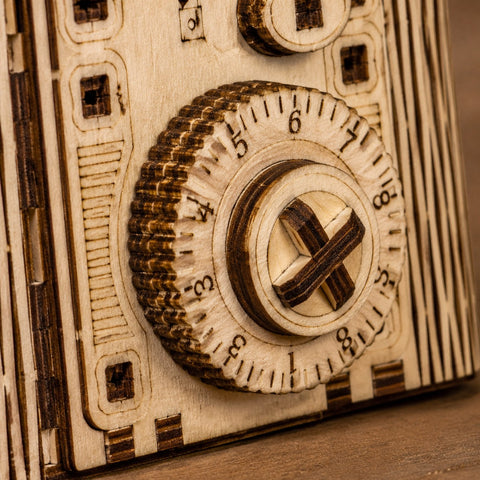 Macro close-up of laser-cut wooden gears and combination dial details