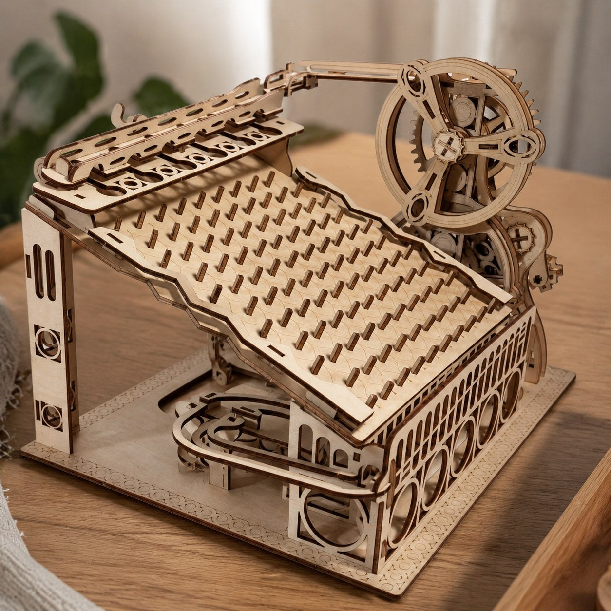 Close-up of laser-cut wooden gears and pegs
