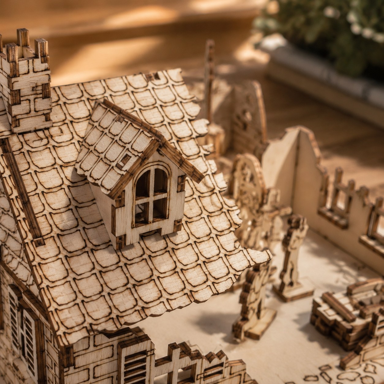 Close-up of laser-engraved brick details on the wooden diorama