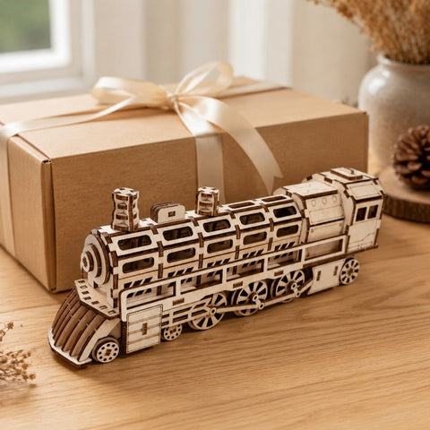 Wooden train puzzle displayed next to a wrapped gift box
