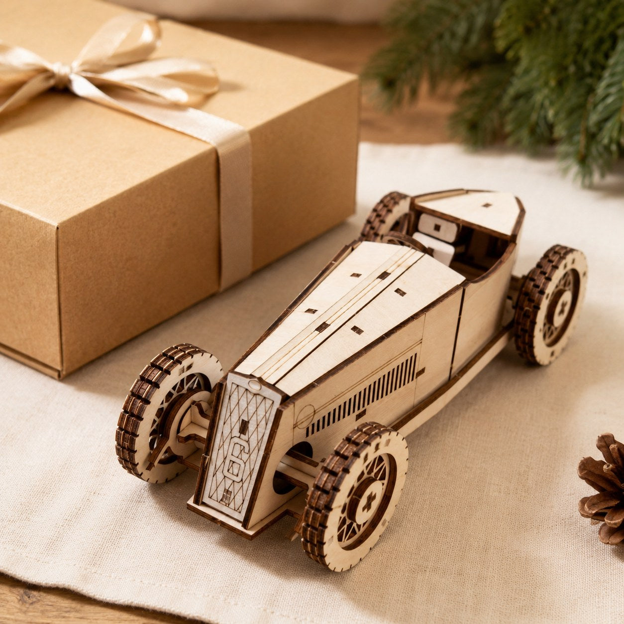 Vintage Grand Prix Race Car 3D Wooden Puzzle displayed next to a gift box