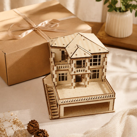 Modern Villa 3D wooden puzzle displayed next to a gift box