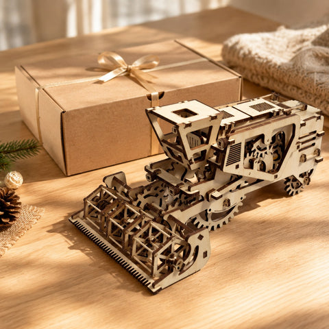 Mechanical Combine Harvester 3D Wooden Puzzle next to a gift box