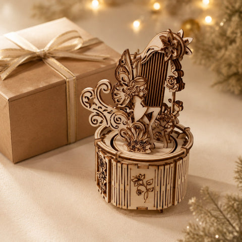 Jigden Fairy Harp 3D Wooden Puzzle next to a gift box