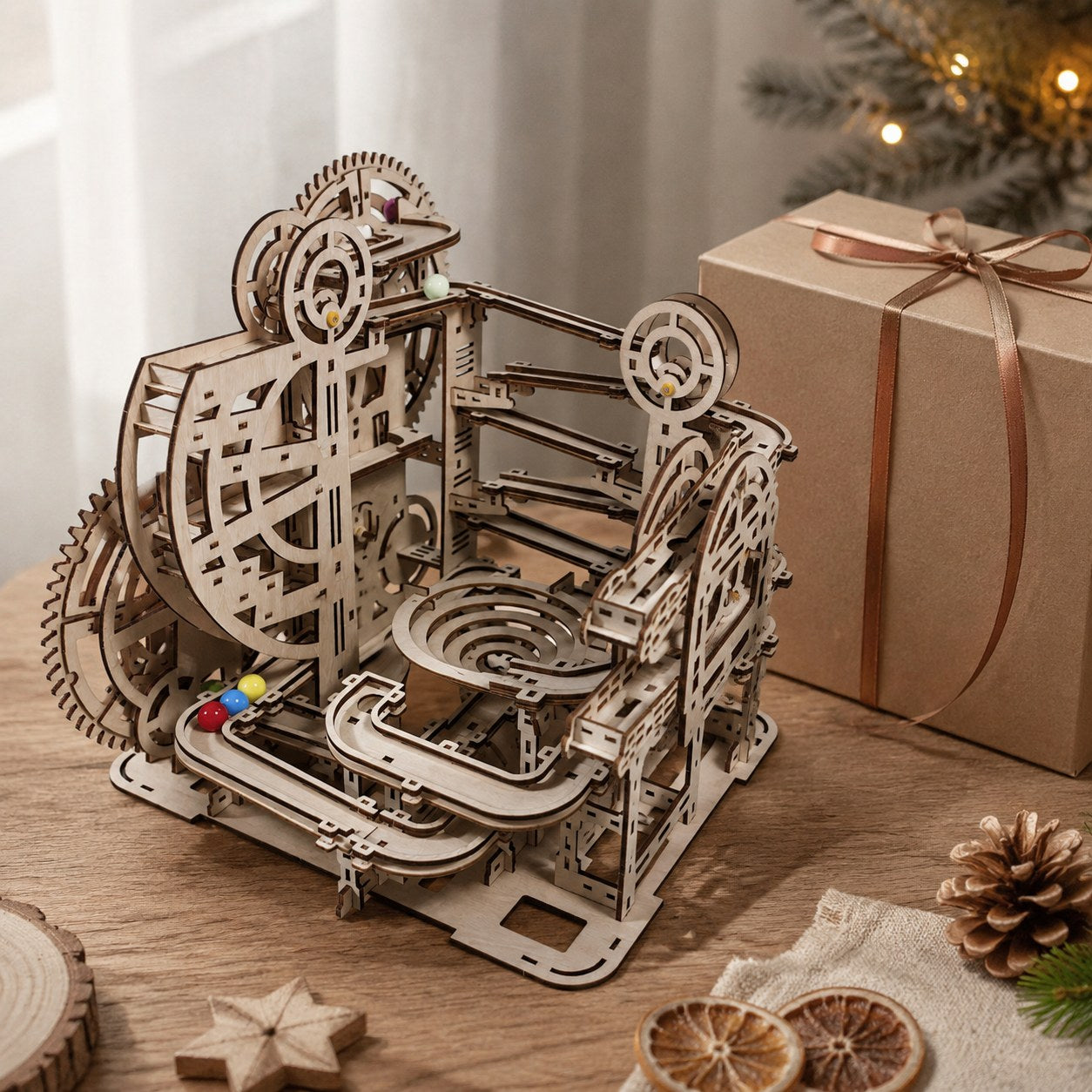 Wooden marble run puzzle next to a gift box